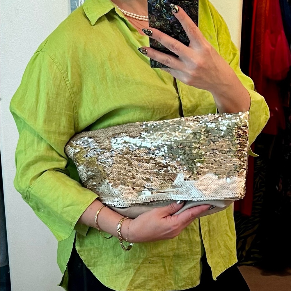 Faux leather and sequence clutch